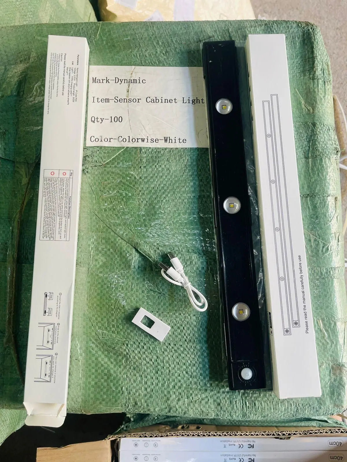 LED motion sensor cabinet light with three brightness settings and easy installation accessories